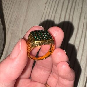 Gold Ring with Green Gemstones